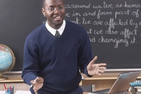 Teacher smiling and gesturing